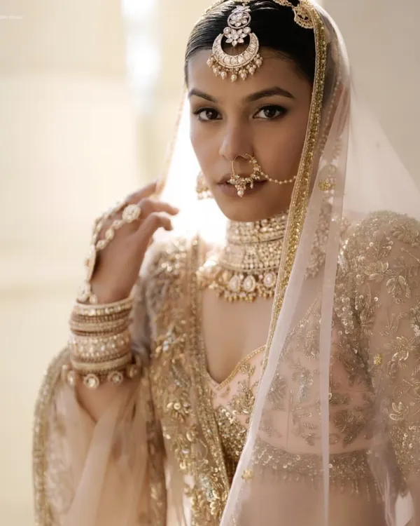 This is the essence of my bridal philosophy: timeless, elegant, and radiant. I focused on creating flawless, glowing skin and defining her eyes to enhance her natural beauty, ensuring her look is as unforgettable as her special day.