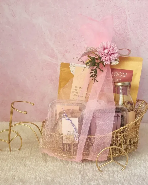 A touch of elegance in this whimsical golden tricycle basket. It's filled with our gourmet treats and beautifully wrapped, making it a unique and memorable gift.
