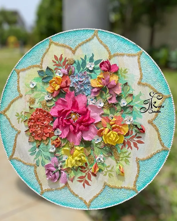 This 14-inch circular panel is what I call a "Valley of Flowers." I used a vibrant mix of colors and flower types, like peonies, roses, and hydrangeas, each sculpted petal by petal with a palette knife to create this dense, joyful bouquet that feels like it's blooming right off the wall.