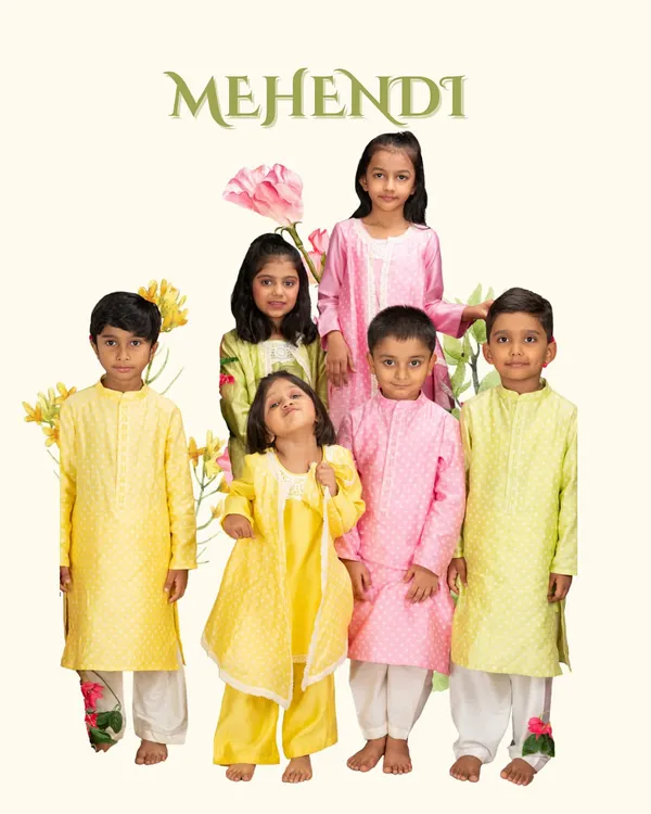 This image from my 'Mehendi' collection showcases a beautiful array of outfits in festive yellows, pinks, and greens. I designed these to be perfect for daytime wedding functions, ensuring the kids are comfortable and stylish.
