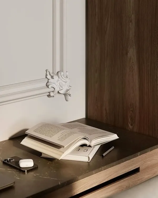 A 3D design render showing a close-up of a study nook within a living room. This visualization helps in planning details like decorative molding and material finishes.