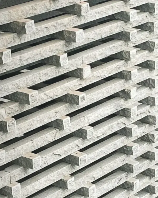 A symphony in stone. This granite jaali, or screen, was designed for our Tiruppur house. The interplay of solid and void, light and shadow, creates a texture that is both modern and deeply connected to Indian craft traditions.