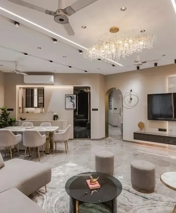 This open-plan living and dining space is the heart of the home, designed for connection and comfort. I used a harmonious blend of soft neutral tones, layered lighting, and architectural arches to create a feeling of expansive, modern luxury. Every element, from the marble flooring to the custom furniture, is intentionally chosen to craft a sophisticated yet inviting atmosphere.
