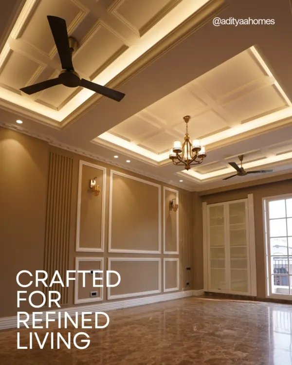This is the feeling I want you to have the moment you walk in. A grand living space with high ceilings, beautiful Italian marble under your feet, and intricate wall and ceiling work that just says 'luxury'. It’s not just a room; it’s a statement.
