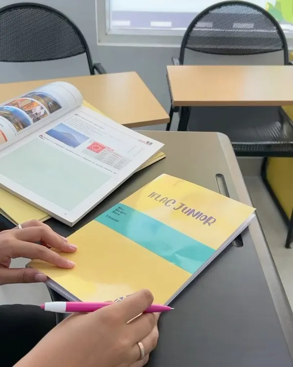 Our "IFLAC Junior" workbook, designed to make language acquisition for young learners an engaging and supportive experience.