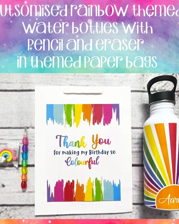 This colorful rainbow-themed gift set includes a personalized stainless steel water bottle, a rainbow pencil and eraser, all packed in a custom paper bag.