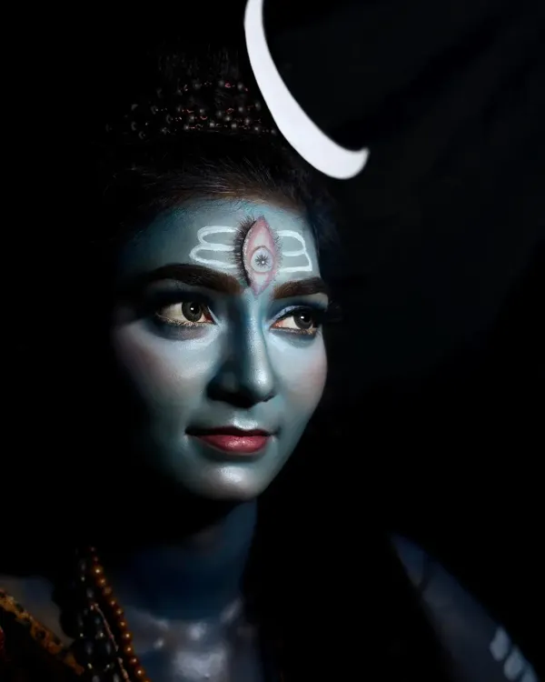 A profile view of my Lord Shiva makeup, highlighting the contouring and shading used to create a powerful facial structure. The dramatic lighting emphasizes the divine and formidable nature of the character.