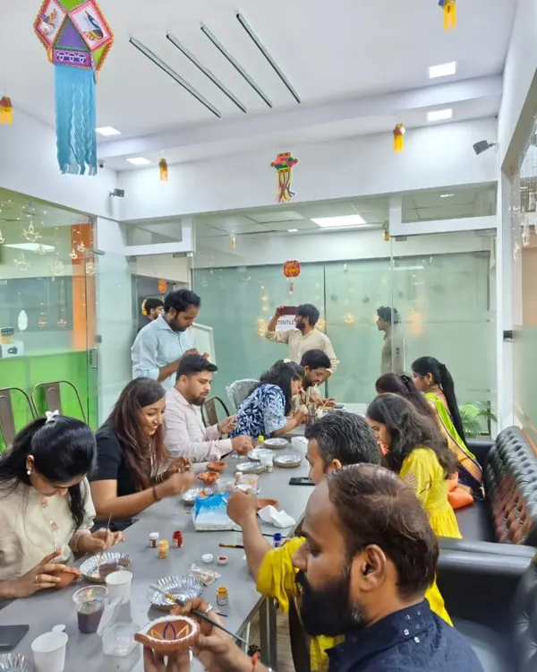 Here is a wide view of a corporate Diwali workshop in full swing. I set up everything your team needs to start creating, right in the comfort of your office space.