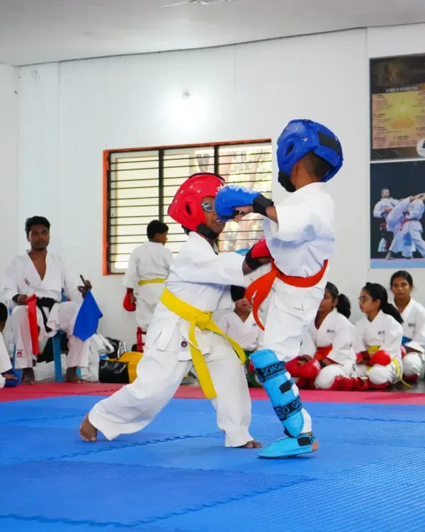This is where training meets application. Our young karate students learn to spar in a safe and controlled environment, wearing full protective gear. This practice builds not just skill and reflexes, but also respect for their training partners.
