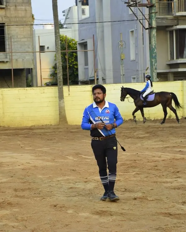 Our head coach, Nitin Gupta, observing a training session. His expertise and guidance during our camps help our competitive riders understand the meaning of true horsemanship.