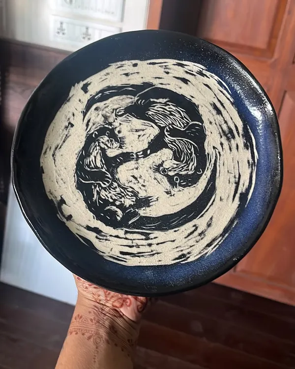 This incredible Sgraffito plate was made by a student. The detail and artistry are just amazing to see.