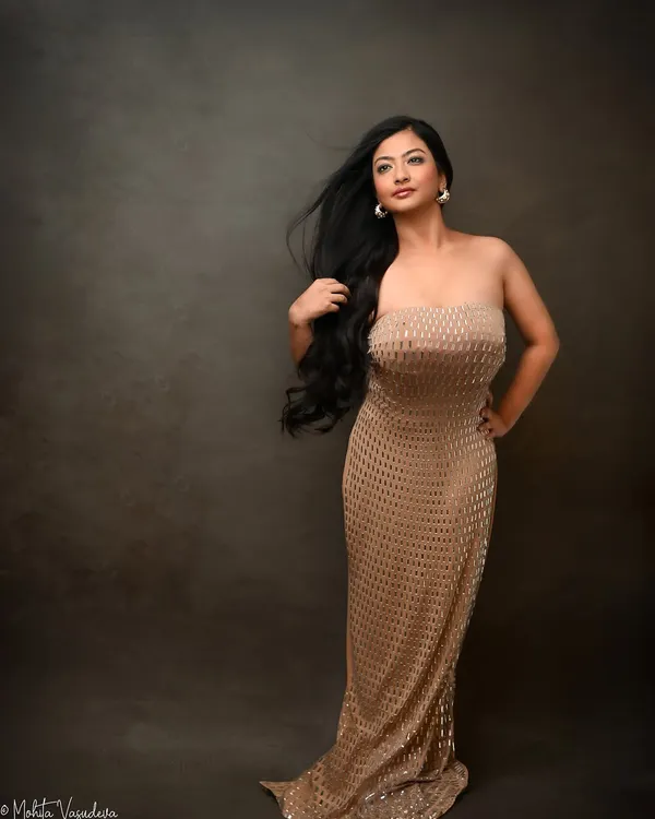 For an actor's portfolio, a glamour shot is essential. With her hair catching the breeze, this portrait exudes confidence and star quality, perfect for a leading role.