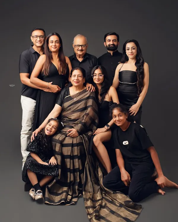 This is what it's all about. I love capturing multiple generations in one frame, creating a timeless family portrait that tells a story of legacy and love. This elegant group photo shows how I pose large families to look connected and natural.