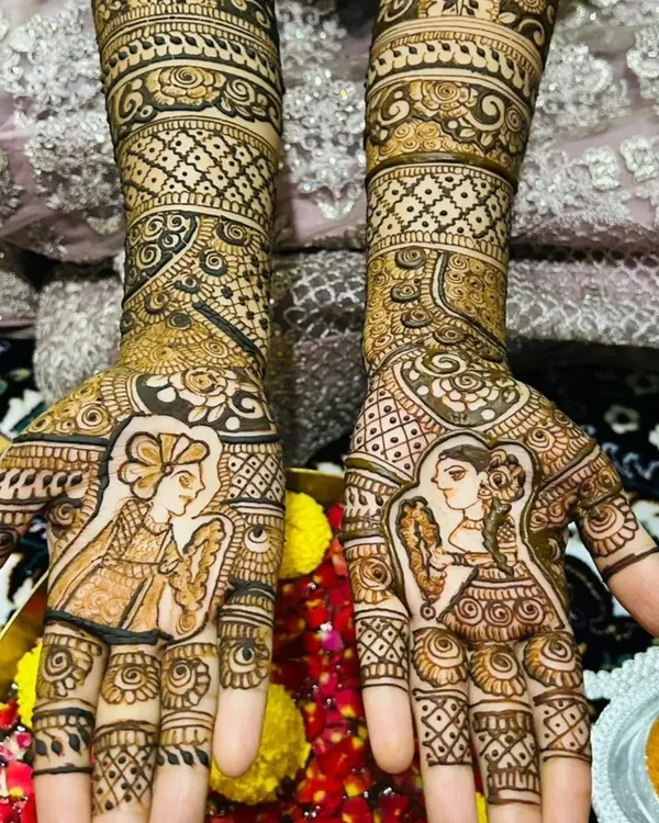 This is the kind of art I love to create. A beautiful, detailed bridal henna design featuring custom portraits of the bride and groom, telling their unique love story right on their hands.