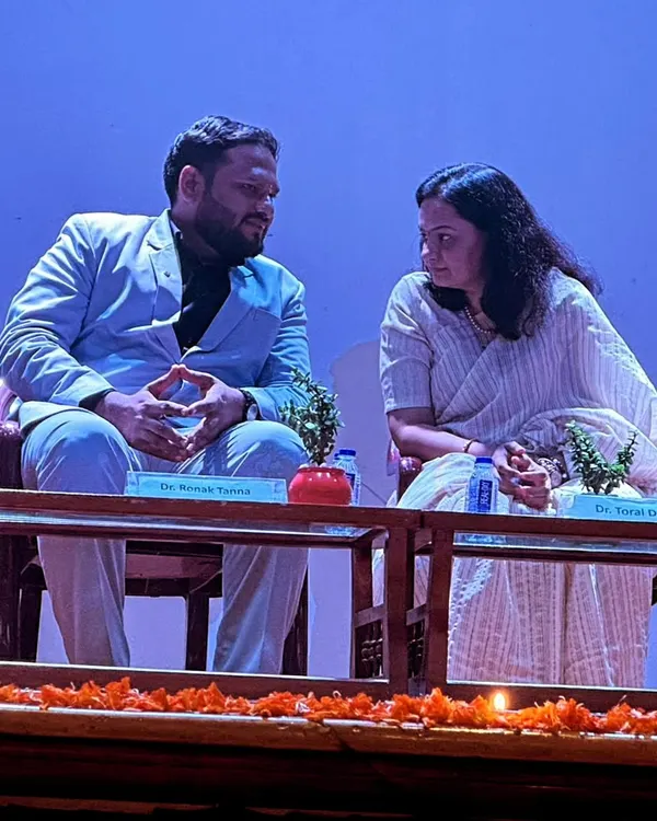 On stage during a panel discussion at ITM Kharghar. Engaging in dialogue with other experts is crucial for exploring how ancient knowledge can solve modern problems.