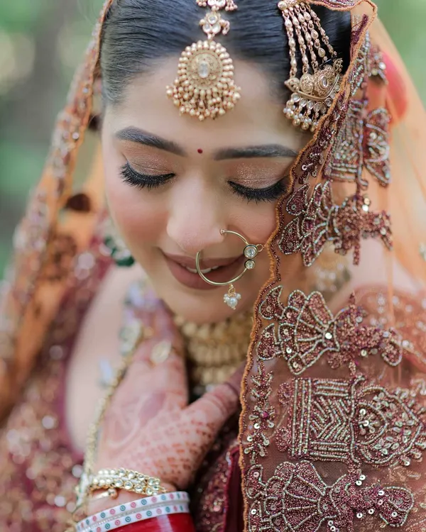 A close-up of my signature bridal makeup. I teach my students how to create this soft, shimmering eye look with flawless skin that looks absolutely radiant in professional photos.