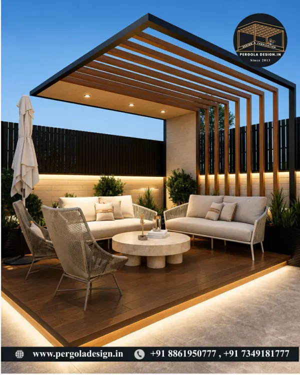 A glimpse into the lifestyle we create. This modern backyard lounge features a custom pergola with a wood-finish ceiling, integrated ambient lighting, and a comfortable seating arrangement, transforming the space into a private resort for evening relaxation.