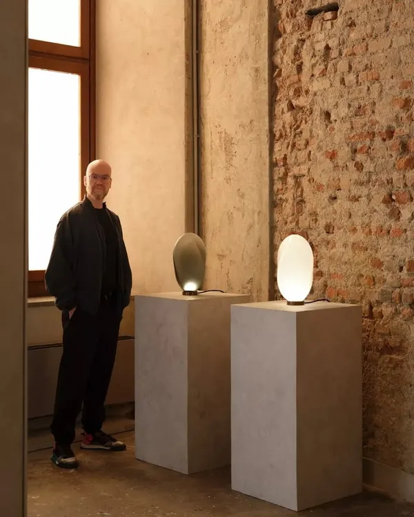 The Solace table lamp, born from experiments that push the boundaries of traditional glassblowing. Each piece has a distinct, subtly textured surface, making every lamp truly one of a kind.