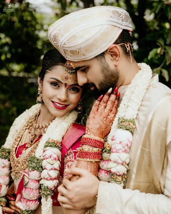 This is the kind of moment I live to capture. The quiet connection between two people, surrounded by the beautiful traditions of their wedding day. A perfect muhurtham look.