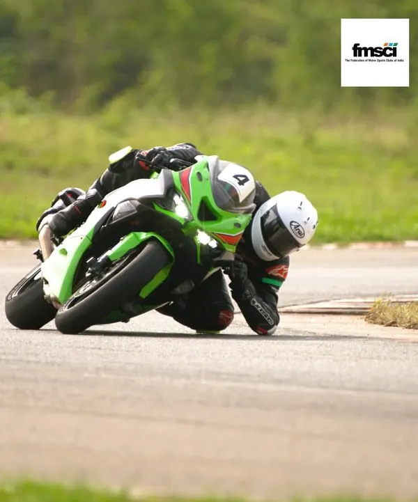 This is what it's all about. Our instructors will teach you the techniques to get your knee, and even your elbow, down on the tarmac safely. This is pure riding joy at the Madras International Circuit.
