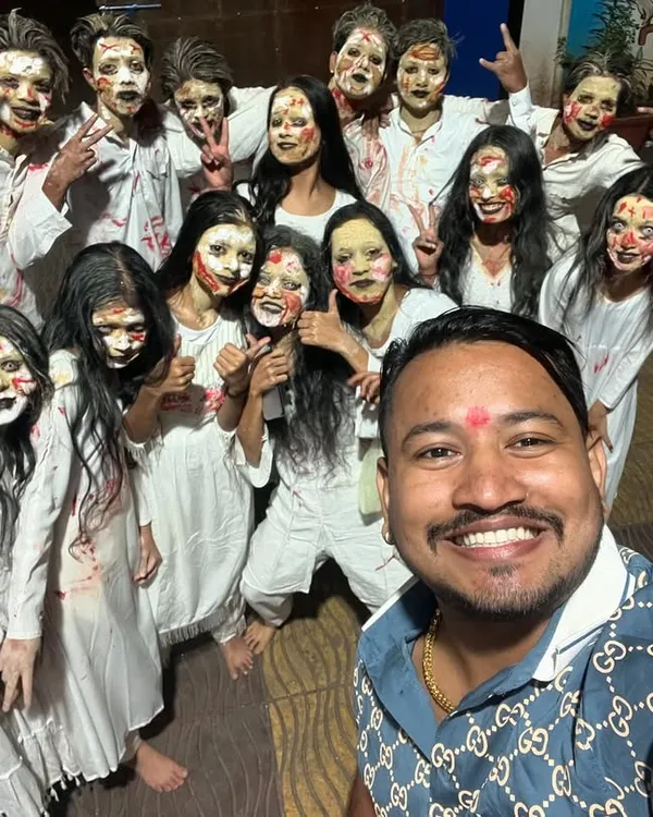 After a show, I took a selfie with these amazing performers in their spooky makeup. It's always fun to collaborate with other artists and entertainers to create a memorable event.