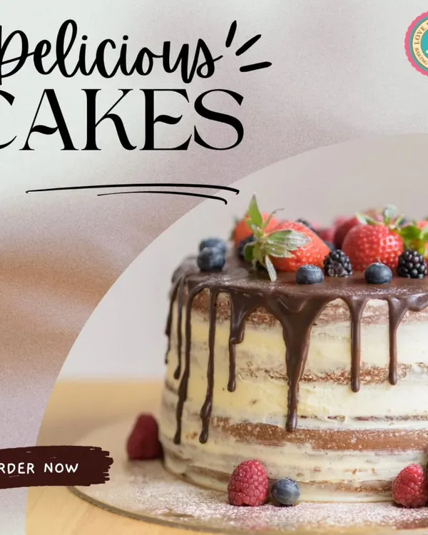 A delicious-looking semi-naked drip cake. This rustic yet elegant design is topped with fresh strawberries, blueberries, and blackberries, with a rich chocolate drip running down the sides.