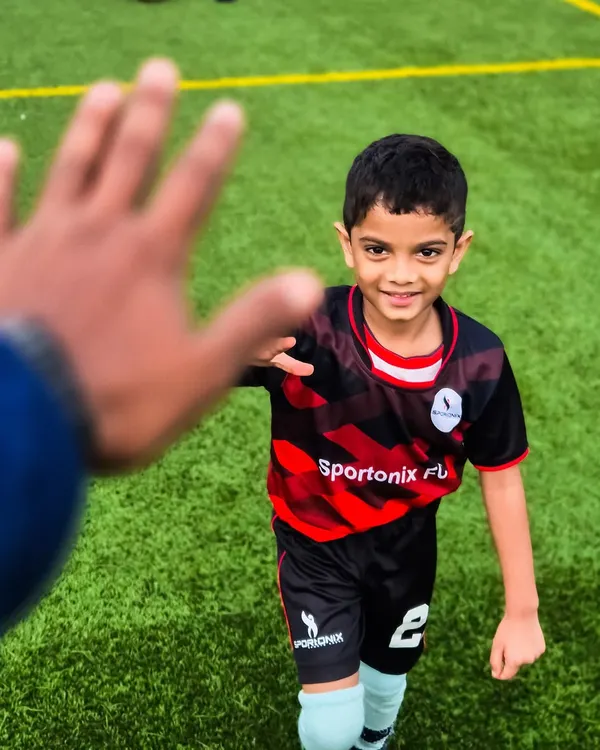 This is what it's all about. A high five after a great effort shows the supportive and positive bond we build with every player on the field.
