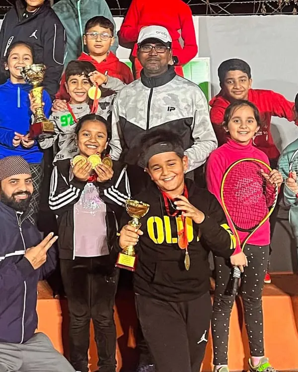 A proud moment for our coaches and young champions at the Tennis Premier League. This group photo captures the joy and community spirit we foster, with players of all ages celebrating their hard-earned trophies and medals together on the podium.