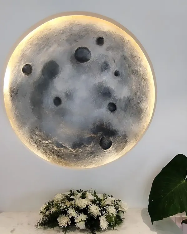 As a moon lover, creating these 3D textured moon murals is a deeply personal and calming process. This backlit piece brings a serene, celestial energy to any space, serving as a stunning focal point for a living room or entryway.