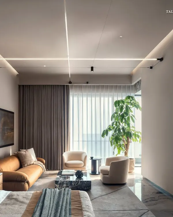 This primary bedroom at Palais Royale is a room of stillness, where serenity takes center stage. A soothing monochromatic palette is layered with soft textures and materials that speak to both comfort and refinement, while expansive windows frame the Arabian Sea.
