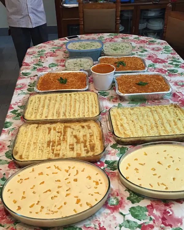 This is what it looks like when Travancore Tasties goes Continental. This was a large order with multiple trays of Shepherd's Pie, spaghetti, a creamy side dish, and my popular tender coconut pudding for dessert.