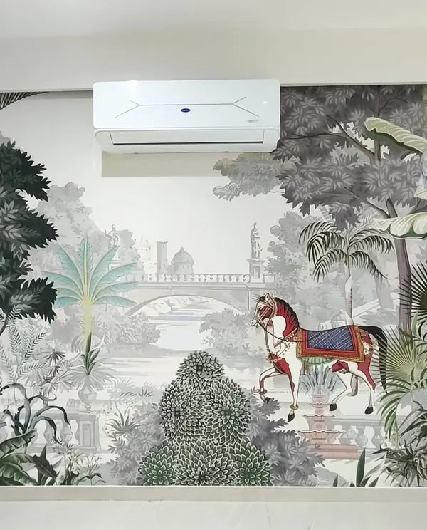 This custom mural brings a touch of Indian royalty to a modern Mumbai home. I take great care to ensure every detail of the design, like the majestic horse and the intricate architecture, is perfectly placed, even when I have to work around challenges like an AC unit.