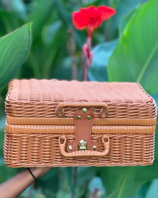 This is the base for many of my creations: a multi-purpose rattan-style suitcase. It's a perfect blend of style and functionality, ideal for creating hampers or for use as a makeup vanity.