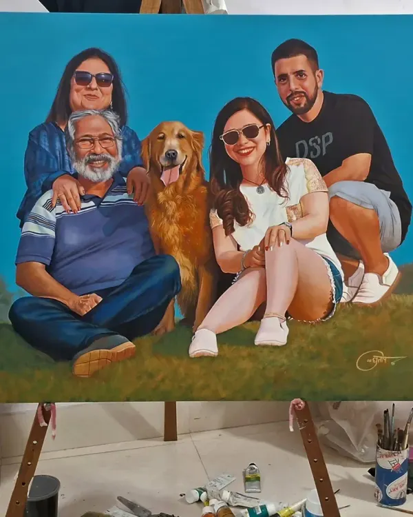 This finished family portrait, including their dog, is displayed on an easel in my studio. The vibrant blue background was chosen by the client to create a modern and cheerful feel for their custom artwork.