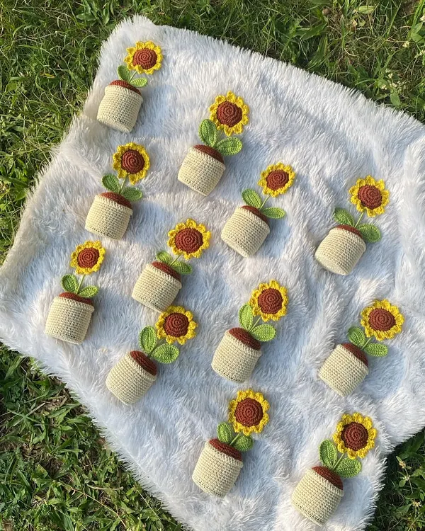 A field of handmade sunflowers ready for a bulk order. It's so satisfying to see them all lined up, ready to bring sunshine to many people.