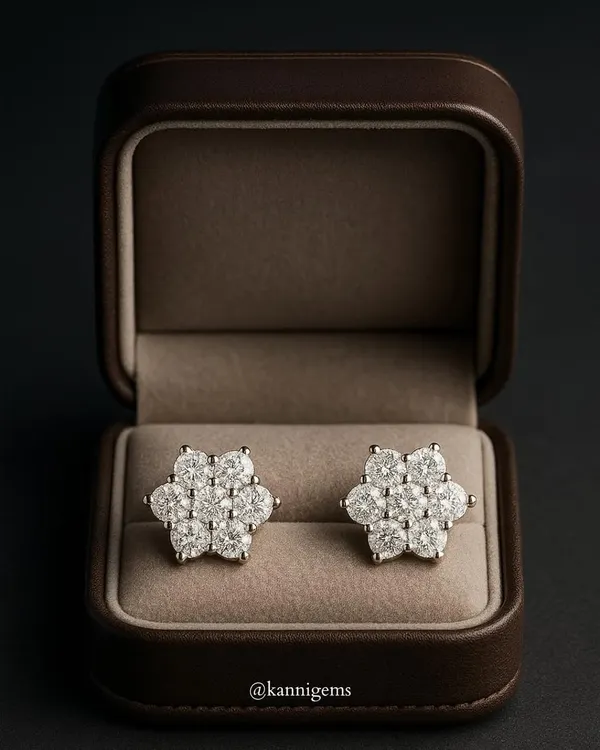 Unveil the timeless beauty of these diamond stud earrings. Designed as a floral cluster, they are crafted with precision to be more than just accessories. They are a reflection of sophistication and grace, presented in a classic leather box.