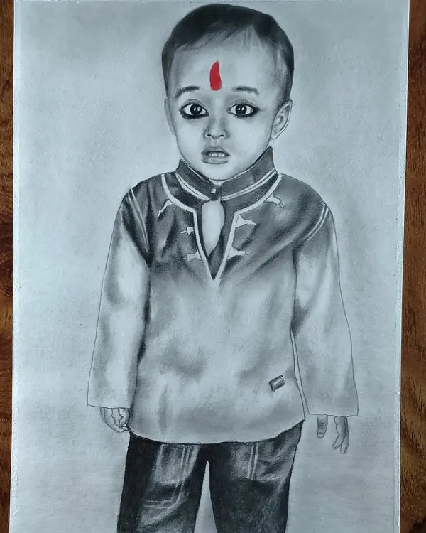 A commissioned portrait of a young boy in a traditional kurta, with the red bindi providing a striking pop of color.