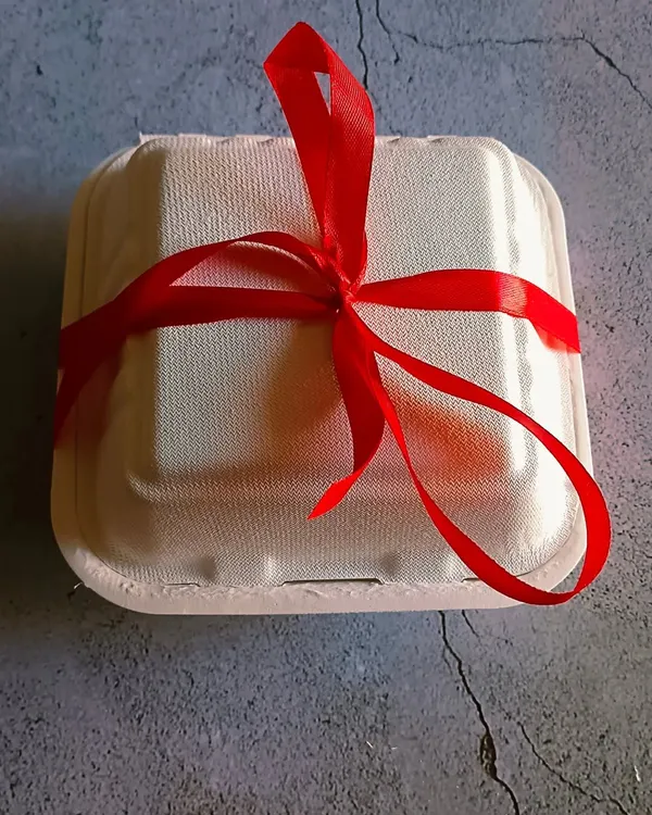 My bento cakes are perfect for gifting or small celebrations. This one is beautifully packaged with a red ribbon, ready to be delivered as a sweet surprise.