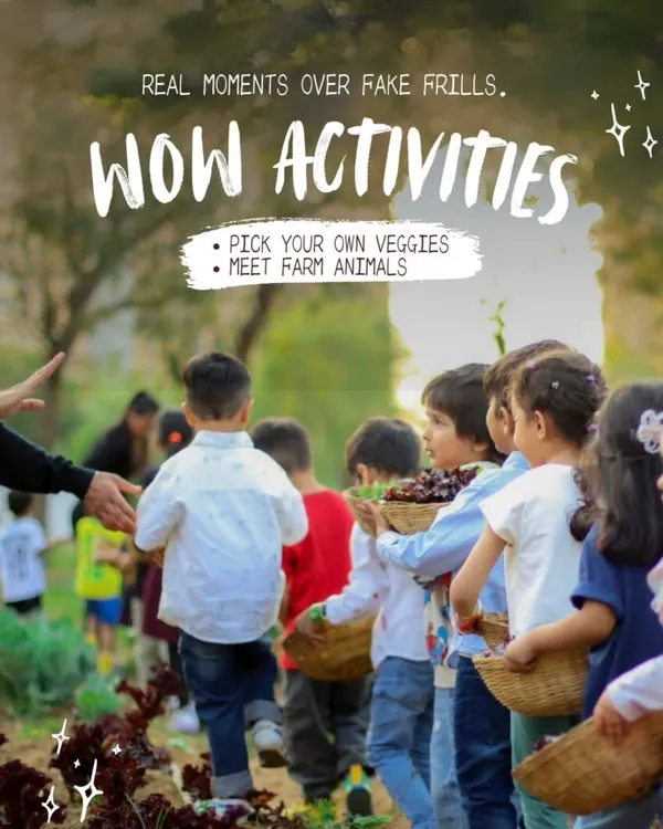 This image perfectly captures our motto: "Real moments over fake frills." A group of children, baskets in hand, are ready to explore the fields and pick their own fresh vegetables.