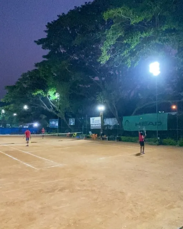 The game continues after sunset. Our courts are fully equipped with floodlights for evening coaching and late-night matches.