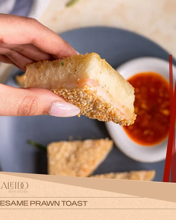 A perfect bite of my Sesame Prawn Toast. The crispy, sesame-crusted shokupan bread and savory prawn filling make this a classic party favorite.