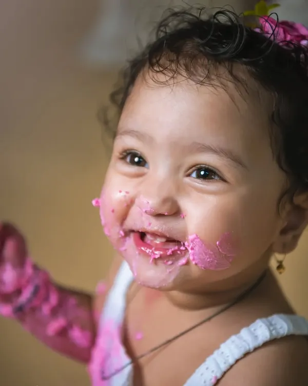 There is nothing more joyful than a baby's first taste of birthday cake. I love capturing the pure, messy delight of a cakesmash, creating memories of that sweet milestone you will cherish forever.