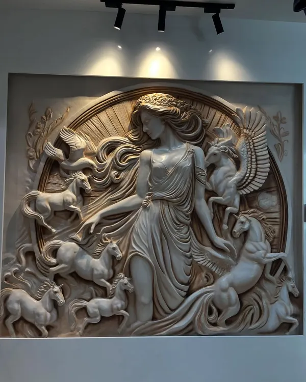 This Greek-inspired fibre mural brings a touch of mythology and elegance to the room. I sculpted the lady and her horses with intricate details to create a timeless piece of 3D wall decor.