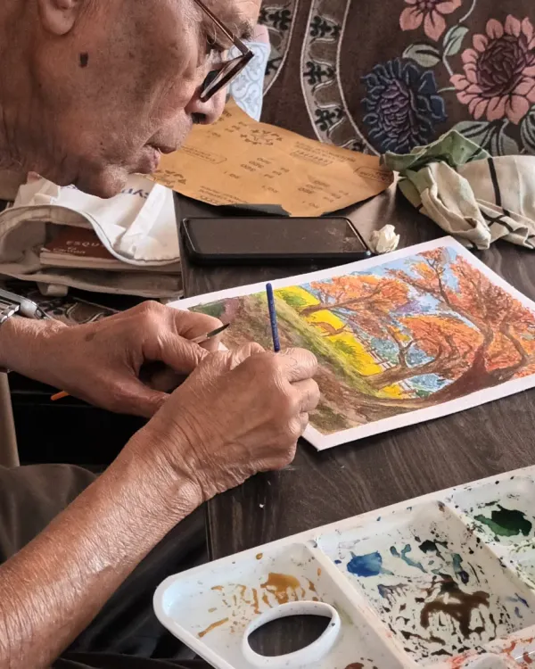 My student, Prafulla sir, who at 85 years old, is a perfect example that passion for art has no age limit. Here he is, fully engaged in his watercolour painting.