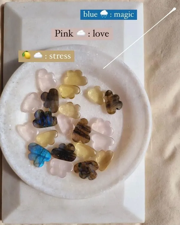 My candy clouds collection. This bowl of cloud-shaped stones includes blue Labradorite for magic, yellow Lemon Quartz for stress, and pink Rose Quartz for love.