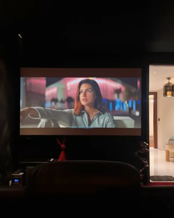 A glimpse into the B1 Paschim Vihar home theater during movie night. The large screen and professionally designed acoustics create an authentic cinematic experience right at home.