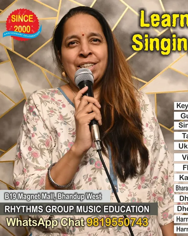 Our vocal classes are designed for everyone, including adults who wish to explore their singing potential. Here, a student practices her singing technique in a one-on-one session at our studio.