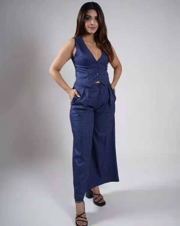 Channel your inner Bhumi Pednekar with this chic navy pinstripe co-ord set. It's the perfect power fit for when you mean business.