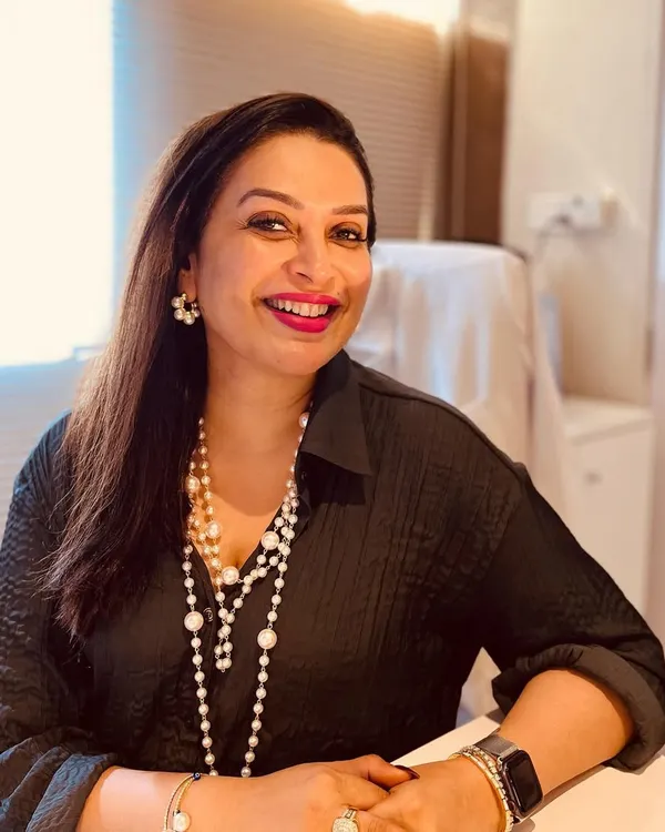 A quiet moment in my office. I believe that feeling good about yourself is a crucial part of overall wellness, and my work is dedicated to helping you achieve that.