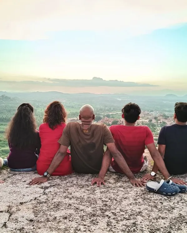 Watching the sunset over Hampi's surreal, boulder-strewn landscape is a core memory from our trips. We find the best spots for the group to sit back, relax, and soak in the incredible views.